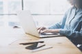 University work process concept. Student girl working new project with generic design laptop. Smartphone wooden table Royalty Free Stock Photo