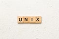 Unix word written on wood block. Unix text on table, concept Royalty Free Stock Photo