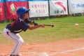 Unknown batter hitting the ball