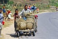 Unknown boys carries a traditional caresa carriage