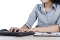 Unknown businesswoman typing on the keyboard