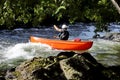 Unknown canoeist, whitewater canoeing at the Minden Wild Water Preserve. Royalty Free Stock Photo