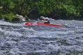Unknown canoeist, whitewater canoeing at the Minden Wild Water Preserve. Royalty Free Stock Photo