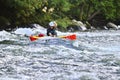 Unknown canoeist, whitewater canoeing at the Minden Wild Water Preserve. Royalty Free Stock Photo