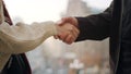 Unknown couple hands shaking outdoors. Closeup man and woman holding hands. Royalty Free Stock Photo
