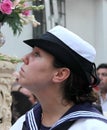 An unknown employee of the Navy at a religious festival in Seville