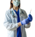 Unknown female doctor in medical uniform with mask holding a syr Royalty Free Stock Photo