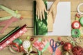 Unknown female hands packing a Christmas gift