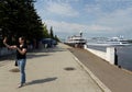 Unknown girl takes a selfie at the river station of Yaroslavl