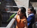 The unknown girls with the parrot on the streets of Potosi.