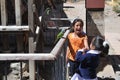 The unknown girls with the parrot on the streets of Potosi.