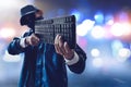 Unknown hacker used keyboard on the street Royalty Free Stock Photo