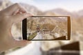 Unknown hands take photo the Great Wall of China