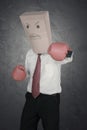 Unknown male manager wearing boxing gloves Royalty Free Stock Photo