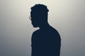 Unknown male person gray silhouette in studio. Anonymous or hidden secret. Royalty Free Stock Photo