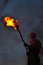 An unknown man holds a burning torch during the Nowruz / Novruz celebration near the city of Akre in Kurdish Iraq, a local traditi