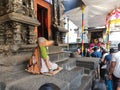 Unknown Old Lady in the shelter of Temple