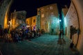 Unknown people having fun in Old Center of Kotor at night, Muntenegro