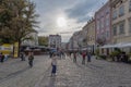 Unknown people on a pedestrian street in the old town of Lviv, Ukraine