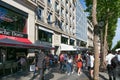 PARIS, FRANCE - JUNE 23, 2017: Unknown people walking in the center of Paris on the Avenue des Champs-Elysees