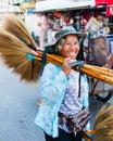 Unknown Street vendor of traditional made brooms, Thailand