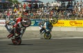 Unknown stunt bikers entertain the audience