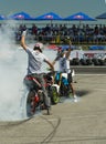 Unknown stunt bikers entertain the audience