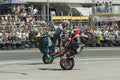 Unknown stunt bikers entertain the audience