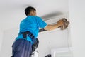 Unknown technician cleaning with a cloth