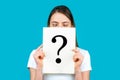 Unknown woman holding question mark. Girl holding paper question mark. Anonymous, woman question, incognita. Anonymous Royalty Free Stock Photo