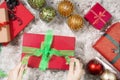 Unknown woman preparing Christmas gift Royalty Free Stock Photo