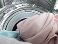 Unknown woman puts the laundry Royalty Free Stock Photo