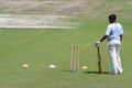 Unknown young cricket player in a training session.