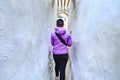 Unknown young woman walking in the old narrow street of Tetouan Medina quarter Royalty Free Stock Photo