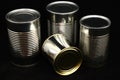 Unlabeled Cans On Black Royalty Free Stock Photo