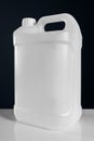 Unlabeled white plastic tank canister chemical liquid container Royalty Free Stock Photo