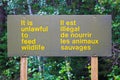 And it is unlawful to feed wildlife sign