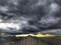Eerie Elegance: Dramatic Black Clouds Gathering in the Sky