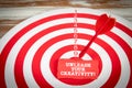 Unleash Your Creativity. Red target with dart