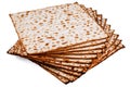 Unleavened bread stacked on white