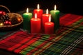 unlit kwanzaa candles arranged on a woven mat