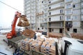 Unload cement from a truck to the construction