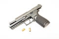 Unloaded handgun with ammo rounds white background