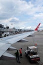 Unloading of baggage from the Air Asia aircraft Royalty Free Stock Photo