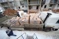 Unloading cement from a truck to the construction