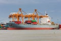 Unloading containers from cargo ships at Bangkok Port Royalty Free Stock Photo