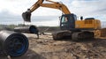 Unloading of corrugated pipes to the warehouse. Telescoping of pipes.