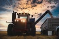 Unloading grain in a sunset landscape Royalty Free Stock Photo