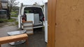 Unloading a home removals van truck full of furniture Royalty Free Stock Photo