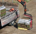 Unloading Rolls of turf